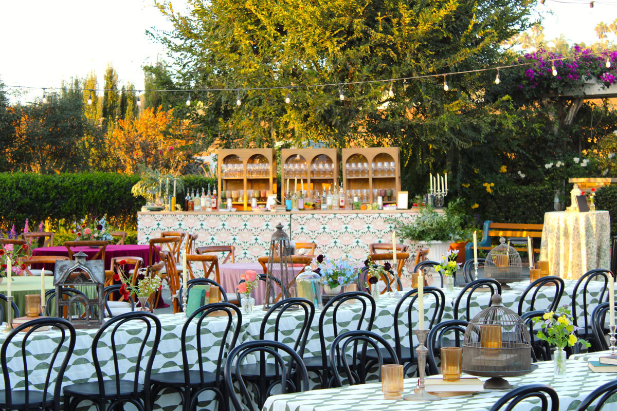 Chairs and tables set up for an event, with floral centerpieces at The Flower Fields Carlsbad.