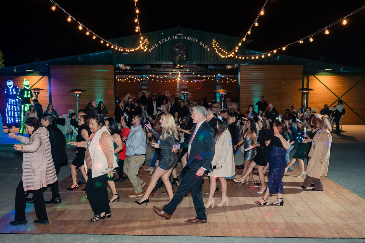 People dancing at a The Flower Fields Carlsbad spot during a corporate event.